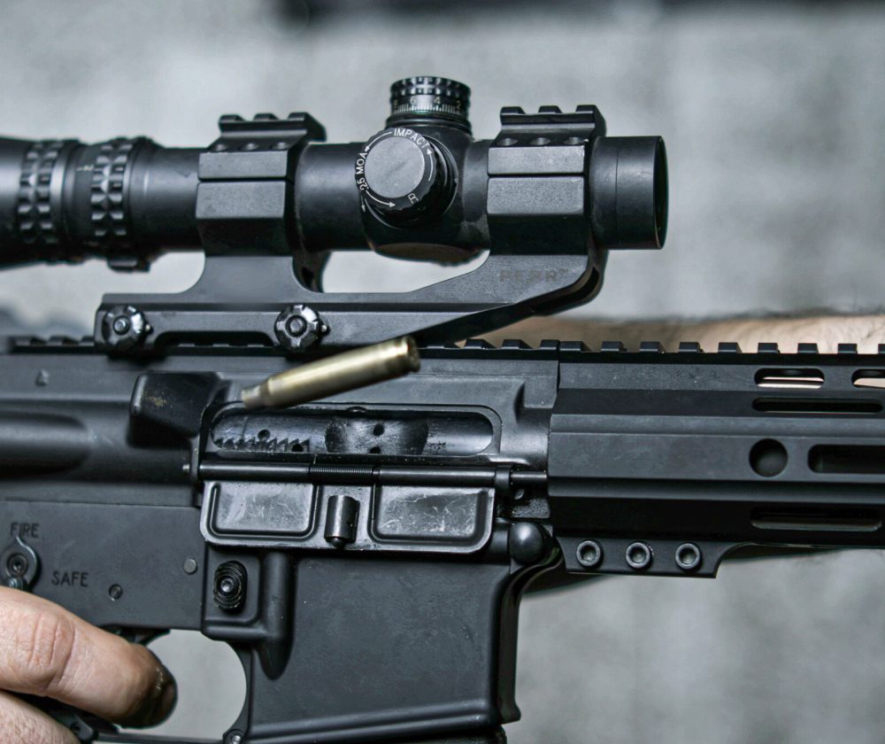 Assault Rifle Detail Close-Up of Finger Pulling Trigger on Assault Rifle, Multipel shots in Super Slow-Motion 800 fps